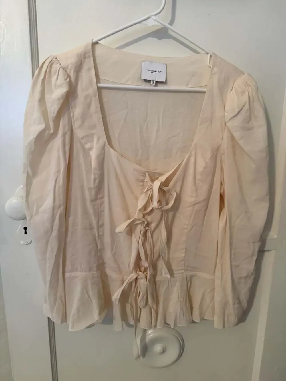 Reformation The Collection Tie-Front Puff Sleeve Ruffle Hem Blouse in Ivory